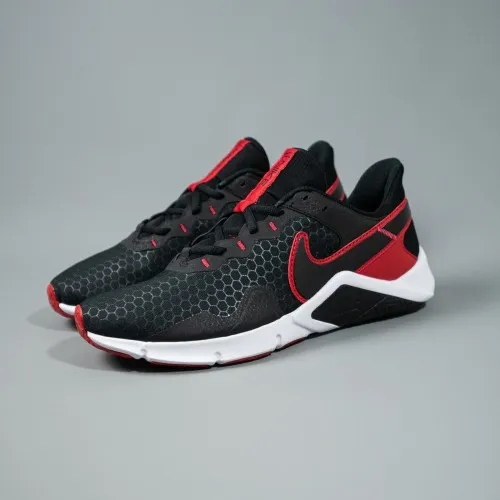 Nike Legend Essential 2 Black / Red - White  The Nike Legend Essential 2 comes equipped with a flat, stable heel, flexibility un