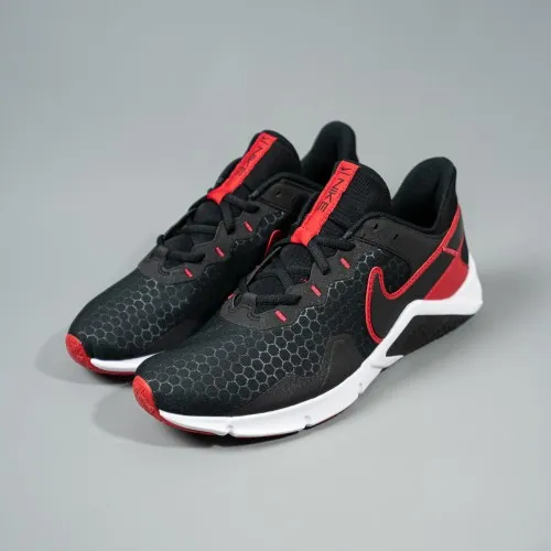 Nike Legend Essential 2 Black / Red - White  The Nike Legend Essential 2 comes equipped with a flat, stable heel, flexibility un